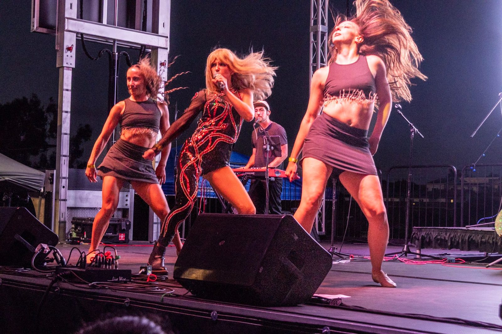 Melody Ebner and dancers mid hair flip